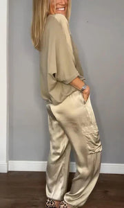 Top feminino de cetim liso e calça com meia manga
