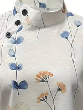 Carregar imagem no visualizador da galeria, Blusa com estampa floral com gola alta e botão inclinado
